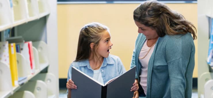 Mother and daughter reading.